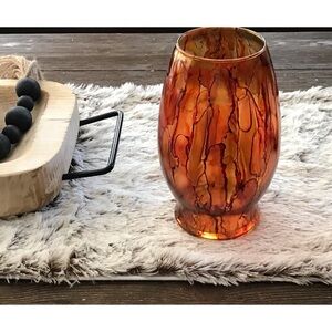Hand crafted brown orange artisan glass vase painted with alcohol inks